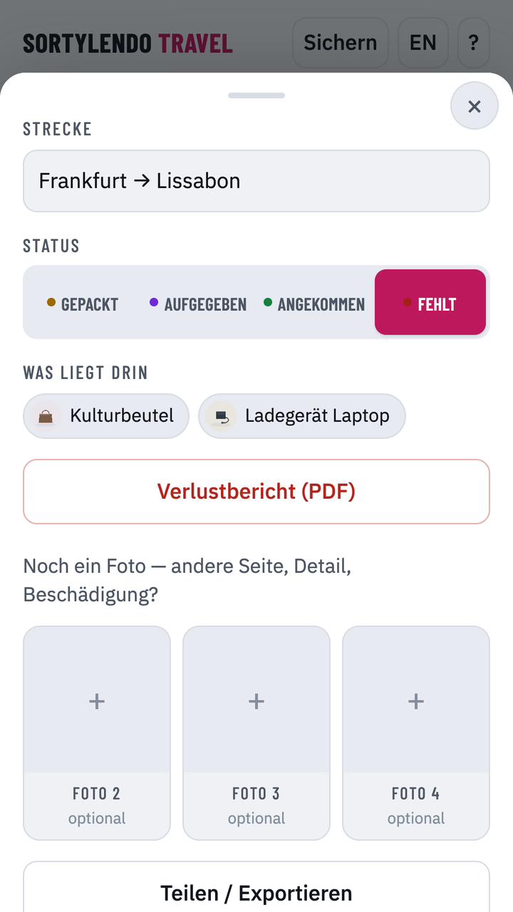 Gepäckstück auf „Fehlt“ gesetzt, darunter der Knopf für den Verlustbericht